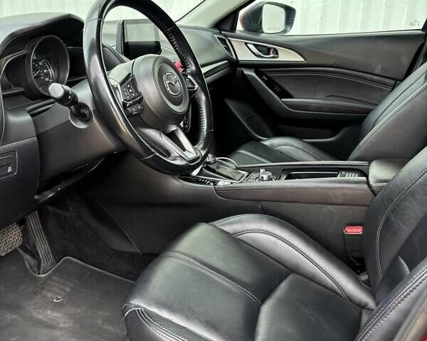 Красный Мазда 3, объемом двигателя 2.5 л и пробегом 105 тыс. км за 13500 $, фото 17 на Automoto.ua