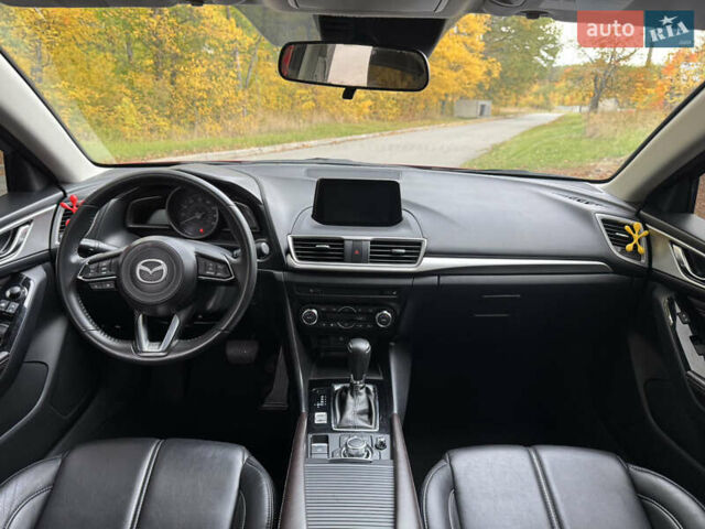 Красный Мазда 3, объемом двигателя 2.5 л и пробегом 180 тыс. км за 13300 $, фото 14 на Automoto.ua