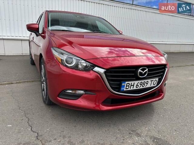 Красный Мазда 3, объемом двигателя 2.5 л и пробегом 105 тыс. км за 13500 $, фото 4 на Automoto.ua