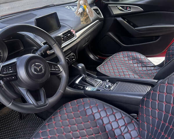 Красный Мазда 3, объемом двигателя 2 л и пробегом 123 тыс. км за 12000 $, фото 6 на Automoto.ua