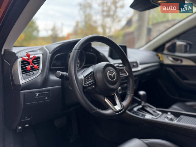 Красный Мазда 3, объемом двигателя 2.5 л и пробегом 180 тыс. км за 13300 $, фото 12 на Automoto.ua