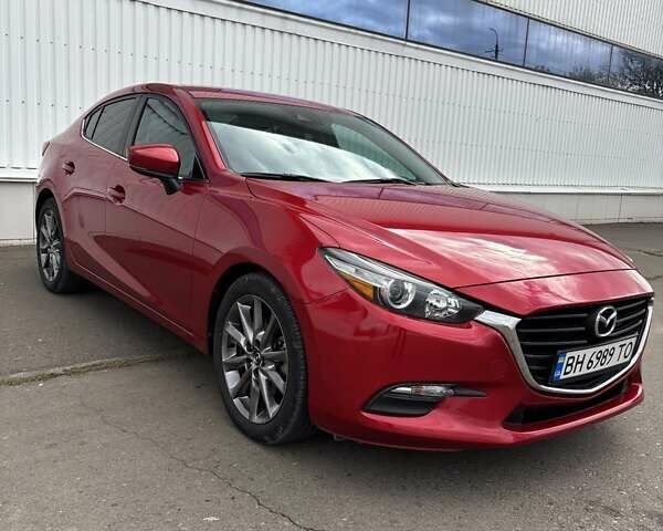 Красный Мазда 3, объемом двигателя 2.5 л и пробегом 105 тыс. км за 13500 $, фото 1 на Automoto.ua