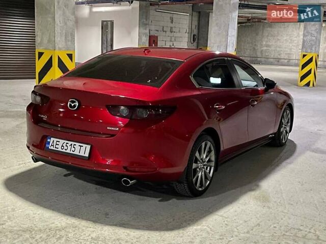 Красный Мазда 3, объемом двигателя 2.49 л и пробегом 72 тыс. км за 12800 $, фото 4 на Automoto.ua