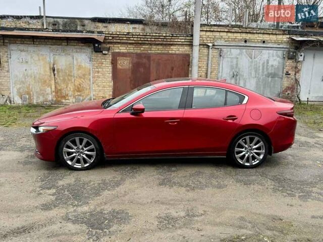Красный Мазда 3, объемом двигателя 2.49 л и пробегом 101 тыс. км за 15900 $, фото 2 на Automoto.ua