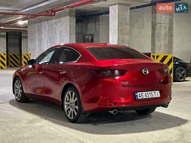 Красный Мазда 3, объемом двигателя 2.49 л и пробегом 72 тыс. км за 12800 $, фото 2 на Automoto.ua