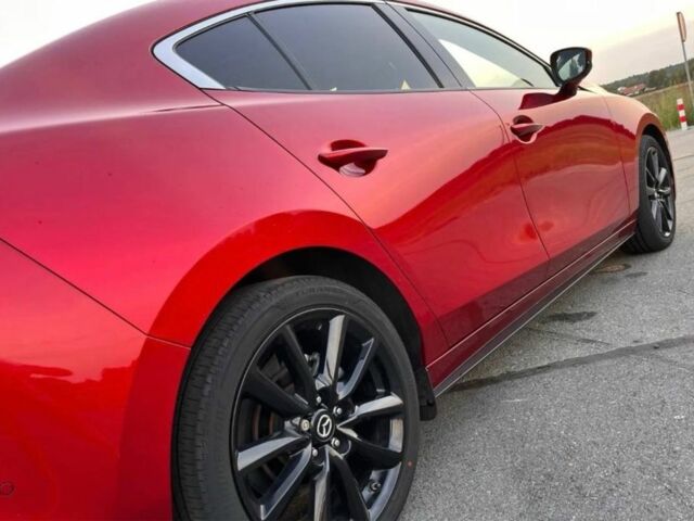 Красный Мазда 3, объемом двигателя 2.5 л и пробегом 69 тыс. км за 9800 $, фото 7 на Automoto.ua