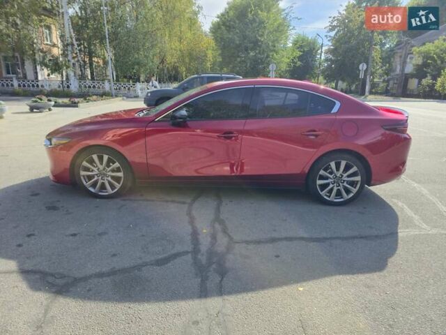 Красный Мазда 3, объемом двигателя 2.49 л и пробегом 49 тыс. км за 23500 $, фото 1 на Automoto.ua