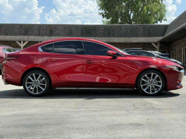 Красный Мазда 3, объемом двигателя 2.5 л и пробегом 19 тыс. км за 14000 $, фото 6 на Automoto.ua