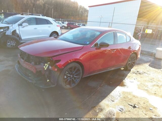 Красный Мазда 3, объемом двигателя 2.5 л и пробегом 27 тыс. км за 14200 $, фото 2 на Automoto.ua