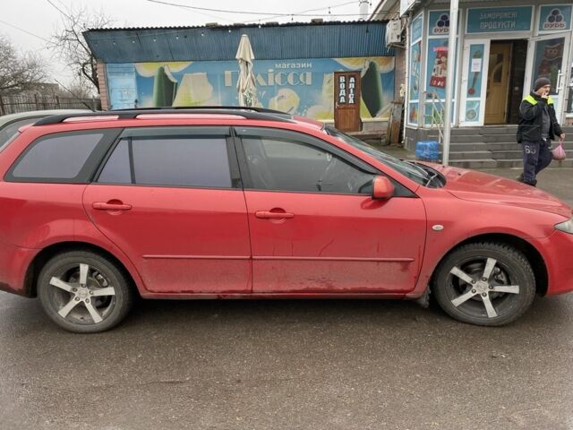 Красный Мазда 3, объемом двигателя 2.3 л и пробегом 503 тыс. км за 3500 $, фото 3 на Automoto.ua