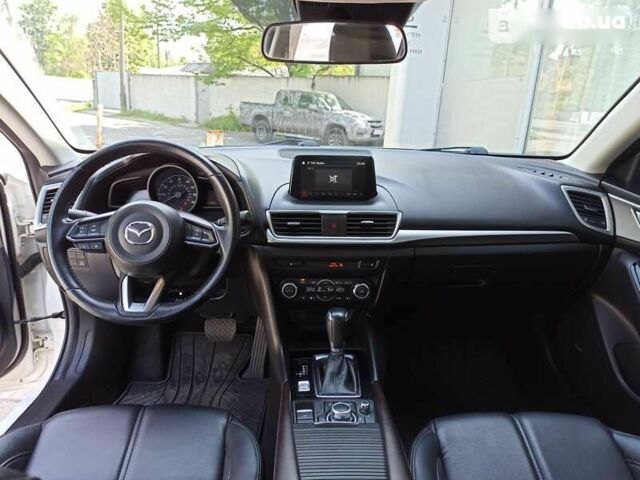 Мазда 3, объемом двигателя 2 л и пробегом 124 тыс. км за 15650 $, фото 12 на Automoto.ua