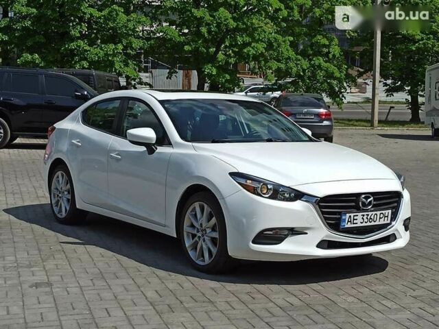 Мазда 3, объемом двигателя 2 л и пробегом 124 тыс. км за 15650 $, фото 4 на Automoto.ua