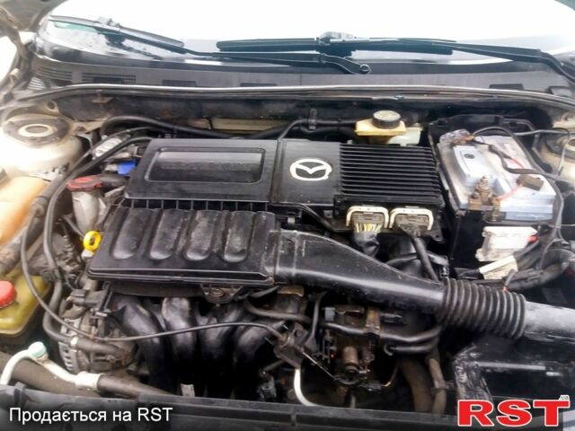 Мазда 3, объемом двигателя 1.6 л и пробегом 245 тыс. км за 3150 $, фото 5 на Automoto.ua