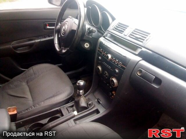 Мазда 3, объемом двигателя 1.6 л и пробегом 245 тыс. км за 3150 $, фото 6 на Automoto.ua