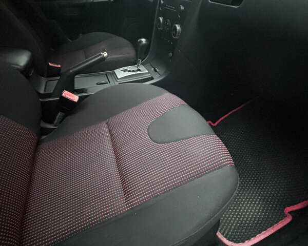 Мазда 3, объемом двигателя 1.6 л и пробегом 306 тыс. км за 4500 $, фото 4 на Automoto.ua