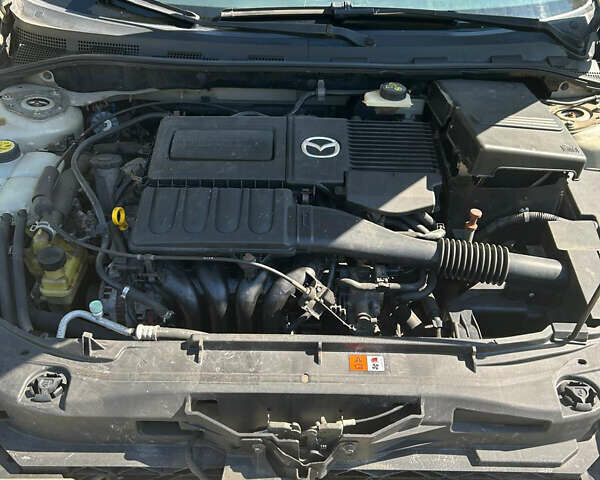 Мазда 3, объемом двигателя 1.6 л и пробегом 65 тыс. км за 6000 $, фото 7 на Automoto.ua