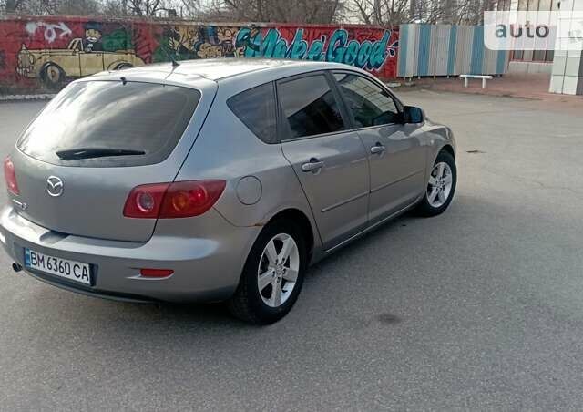 Мазда 3, объемом двигателя 1.35 л и пробегом 243 тыс. км за 4100 $, фото 6 на Automoto.ua