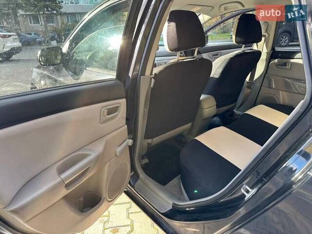 Мазда 3, об'ємом двигуна 1.3 л та пробігом 194 тис. км за 5150 $, фото 4 на Automoto.ua