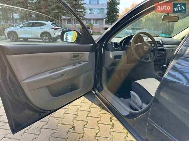 Мазда 3, об'ємом двигуна 1.3 л та пробігом 194 тис. км за 5150 $, фото 10 на Automoto.ua