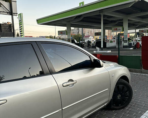 Мазда 3, объемом двигателя 2 л и пробегом 222 тыс. км за 5500 $, фото 7 на Automoto.ua