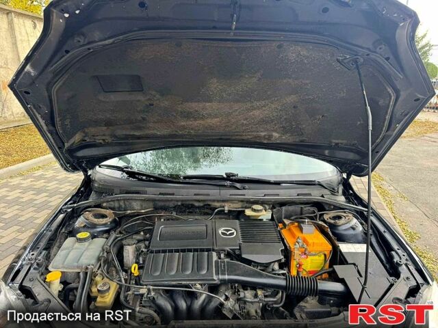 Мазда 3, объемом двигателя 1.6 л и пробегом 215 тыс. км за 5850 $, фото 9 на Automoto.ua