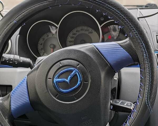 Мазда 3, объемом двигателя 1.3 л и пробегом 213 тыс. км за 4100 $, фото 11 на Automoto.ua