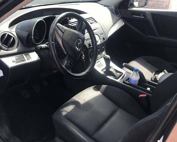 Мазда 3, объемом двигателя 2 л и пробегом 166 тыс. км за 7100 $, фото 4 на Automoto.ua