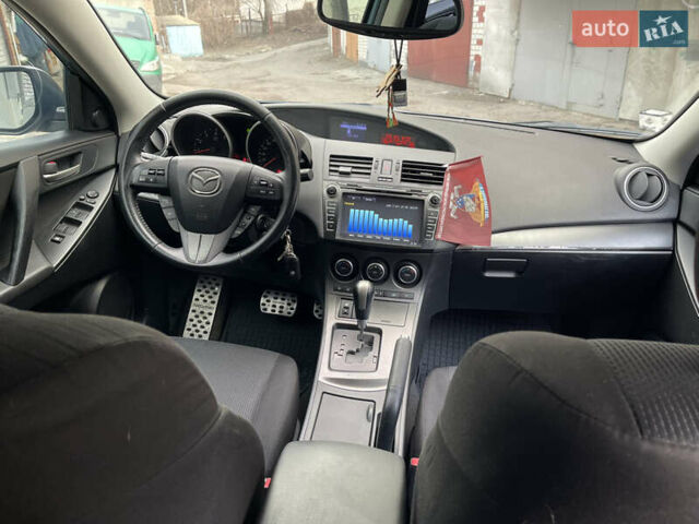 Мазда 3, объемом двигателя 1.6 л и пробегом 161 тыс. км за 8999 $, фото 6 на Automoto.ua