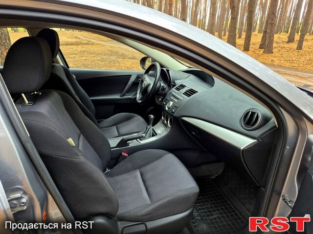 Мазда 3, объемом двигателя 1.6 л и пробегом 194 тыс. км за 7500 $, фото 12 на Automoto.ua