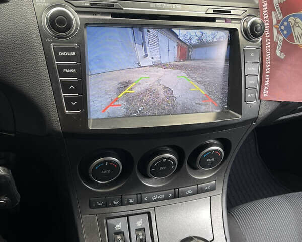 Мазда 3, объемом двигателя 1.6 л и пробегом 161 тыс. км за 8999 $, фото 13 на Automoto.ua