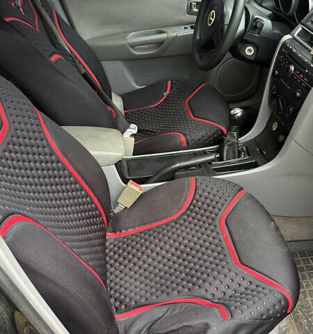 Мазда 3, объемом двигателя 1.3 л и пробегом 321 тыс. км за 2550 $, фото 4 на Automoto.ua