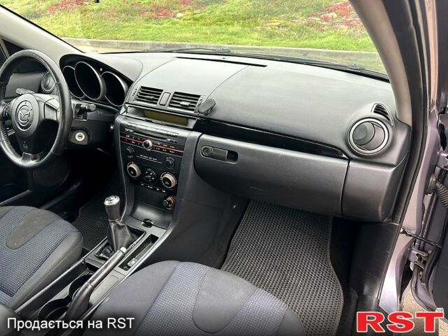Мазда 3, объемом двигателя 2 л и пробегом 250 тыс. км за 2999 $, фото 11 на Automoto.ua