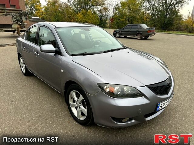 Мазда 3, объемом двигателя 2 л и пробегом 250 тыс. км за 2999 $, фото 6 на Automoto.ua