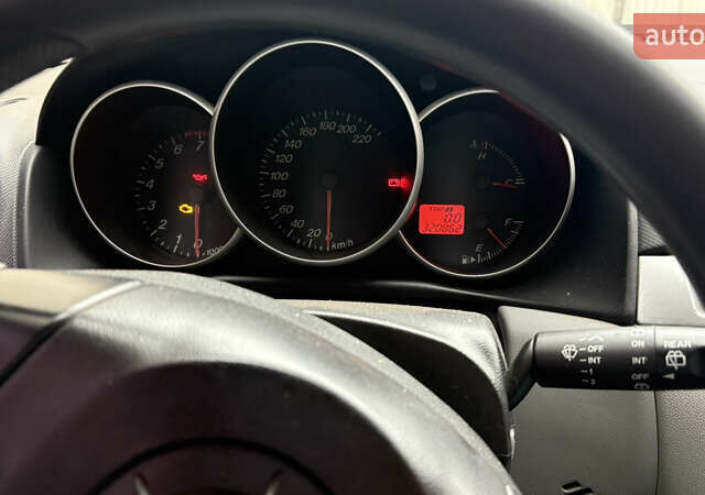 Мазда 3, объемом двигателя 1.3 л и пробегом 321 тыс. км за 2550 $, фото 2 на Automoto.ua