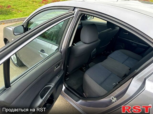 Мазда 3, объемом двигателя 2 л и пробегом 250 тыс. км за 2999 $, фото 8 на Automoto.ua