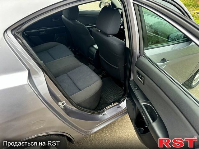 Мазда 3, объемом двигателя 2 л и пробегом 250 тыс. км за 2999 $, фото 10 на Automoto.ua