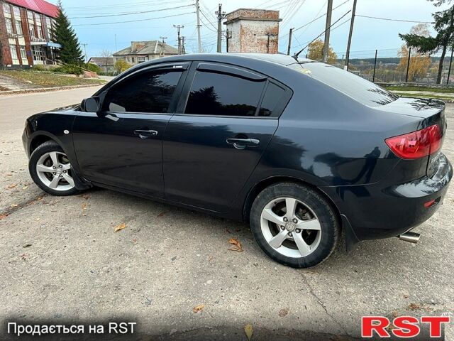 Мазда 3, объемом двигателя 1.6 л и пробегом 346 тыс. км за 4800 $, фото 4 на Automoto.ua