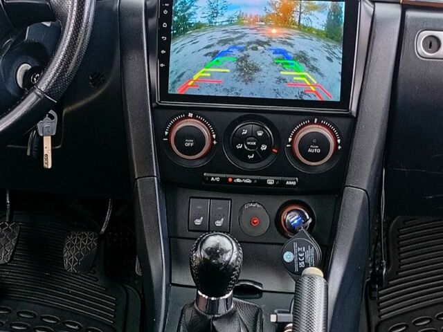 Мазда 3, объемом двигателя 2 л и пробегом 242 тыс. км за 5000 $, фото 8 на Automoto.ua