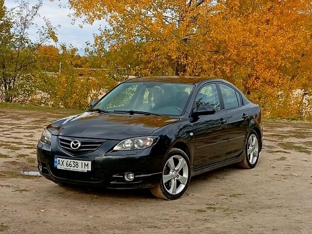 Мазда 3, объемом двигателя 2 л и пробегом 242 тыс. км за 5000 $, фото 2 на Automoto.ua