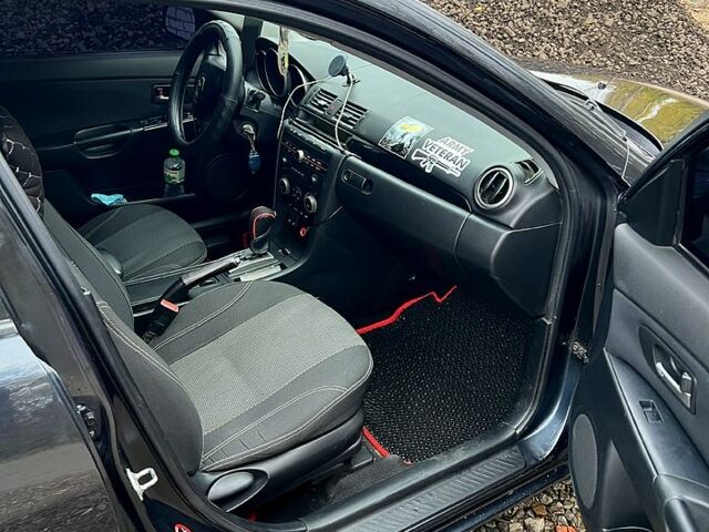 Мазда 3, объемом двигателя 1.6 л и пробегом 346 тыс. км за 4800 $, фото 11 на Automoto.ua