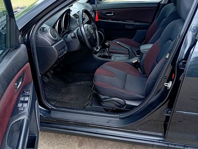 Мазда 3, объемом двигателя 2 л и пробегом 242 тыс. км за 5000 $, фото 7 на Automoto.ua