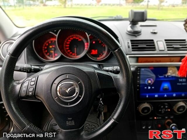 Мазда 3, объемом двигателя 2 л и пробегом 242 тыс. км за 5000 $, фото 6 на Automoto.ua