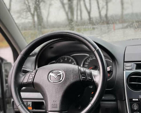 Мазда 3, объемом двигателя 2 л и пробегом 348 тыс. км за 3700 $, фото 5 на Automoto.ua