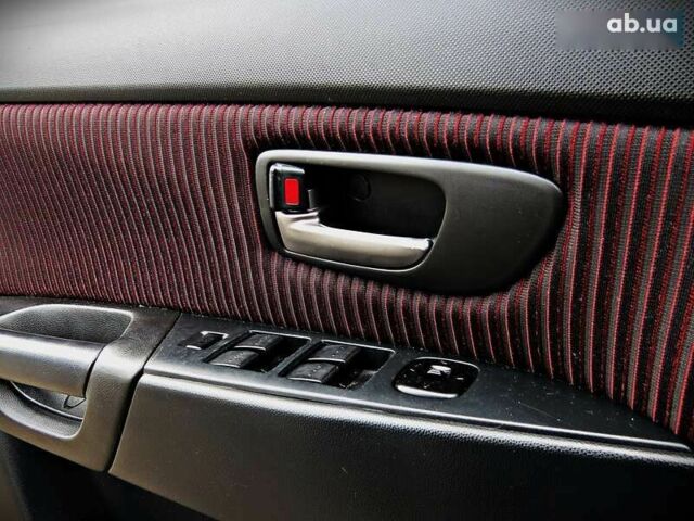 Мазда 3, объемом двигателя 2 л и пробегом 178 тыс. км за 5200 $, фото 6 на Automoto.ua