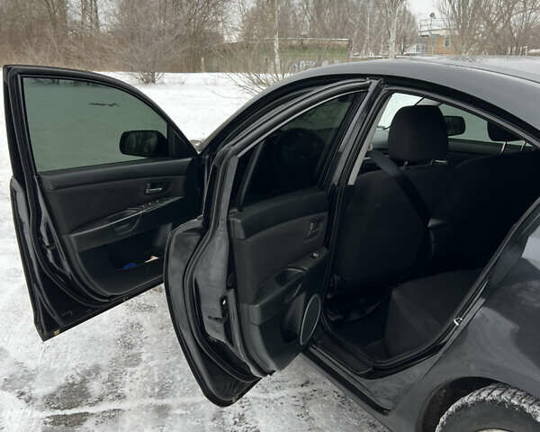 Мазда 3, объемом двигателя 2 л и пробегом 197 тыс. км за 5500 $, фото 7 на Automoto.ua