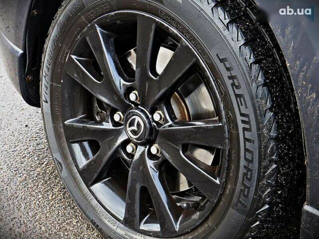 Мазда 3, объемом двигателя 2 л и пробегом 178 тыс. км за 5200 $, фото 4 на Automoto.ua