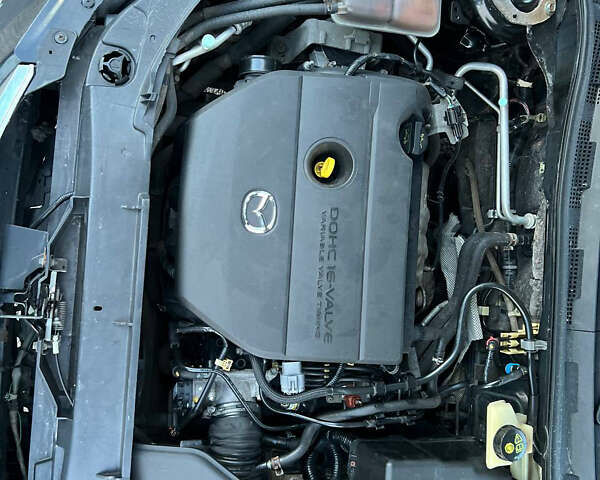 Мазда 3, объемом двигателя 2 л и пробегом 196 тыс. км за 5400 $, фото 11 на Automoto.ua