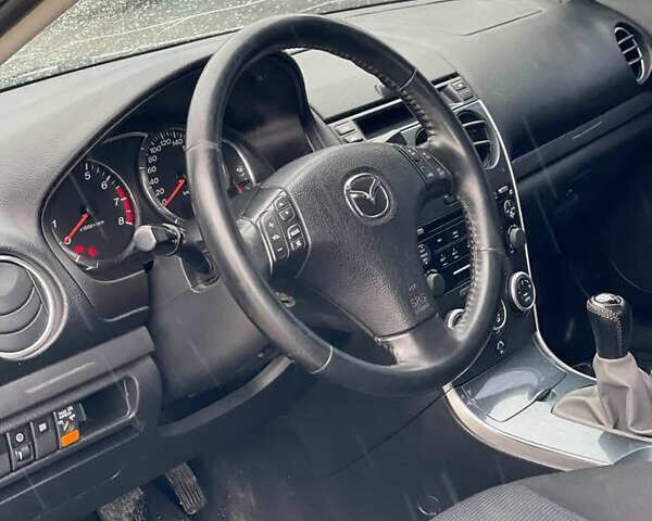 Мазда 3, объемом двигателя 2 л и пробегом 348 тыс. км за 3700 $, фото 2 на Automoto.ua