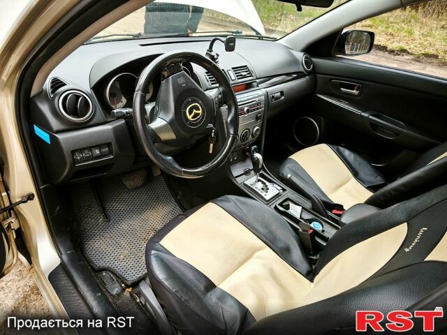 Мазда 3, объемом двигателя 16 л и пробегом 297 тыс. км за 5000 $, фото 5 на Automoto.ua