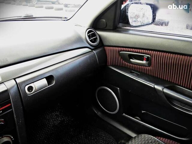 Мазда 3, объемом двигателя 2 л и пробегом 178 тыс. км за 5200 $, фото 13 на Automoto.ua
